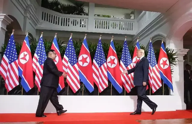 特朗普与金正恩这一“握手”，历史等了65年｜新京报快评
