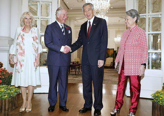 新加坡总理夫人爱穿中国风，红配绿意外显年轻，67岁老得很优雅
