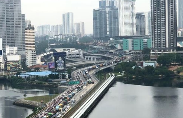 新增4848，新加坡报复性聚集频发，自驾过新马边境愁“买路钱”